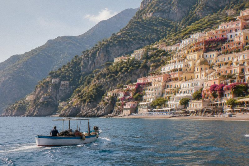 Positano pastel hillside village stacked above the sea on the Amalfi Coast in morning light