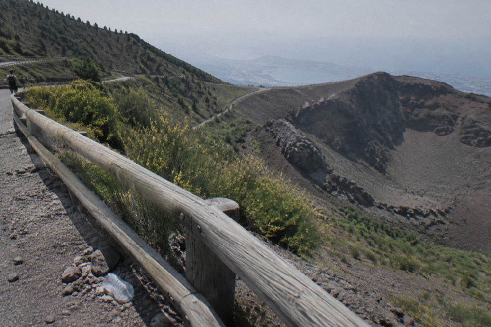 The switchback road climbing the pine covered slopes of Vesuvius toward the crater