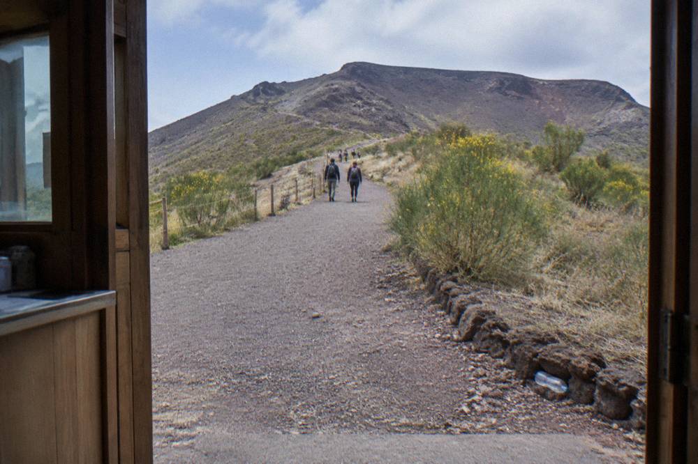The gravel crater trail rising toward the rim of Vesuvius
