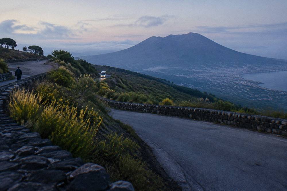 A winding mountain road leading up the slopes of Vesuvius