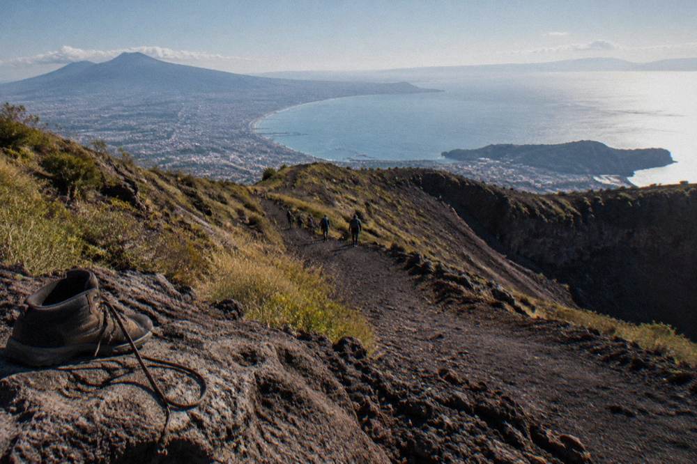 A view across the Bay of Naples from the upper slopes of Vesuvius with the coastline curving toward the Sorrento peninsula