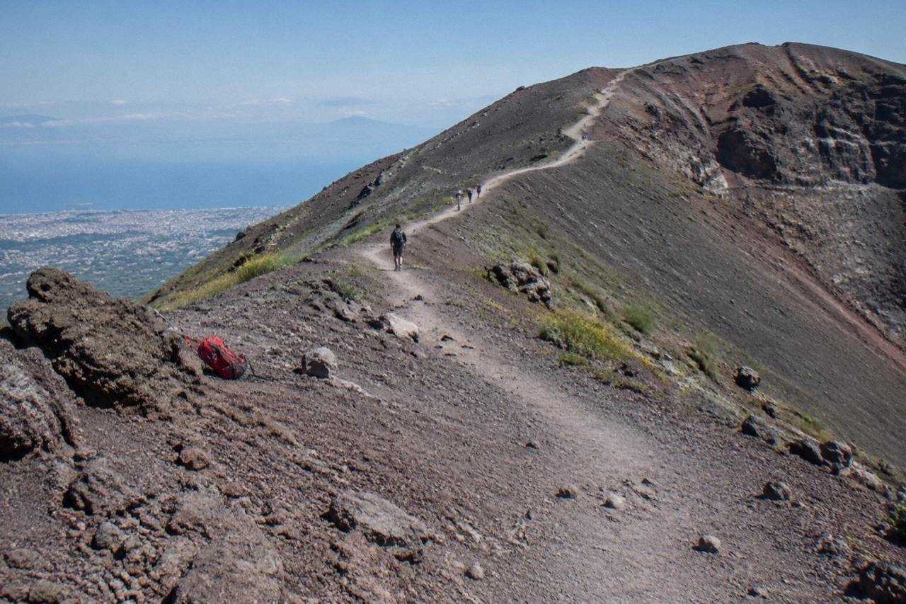 The Gran Cono crater trail rising above volcanic ash slopes under a clear morning sky