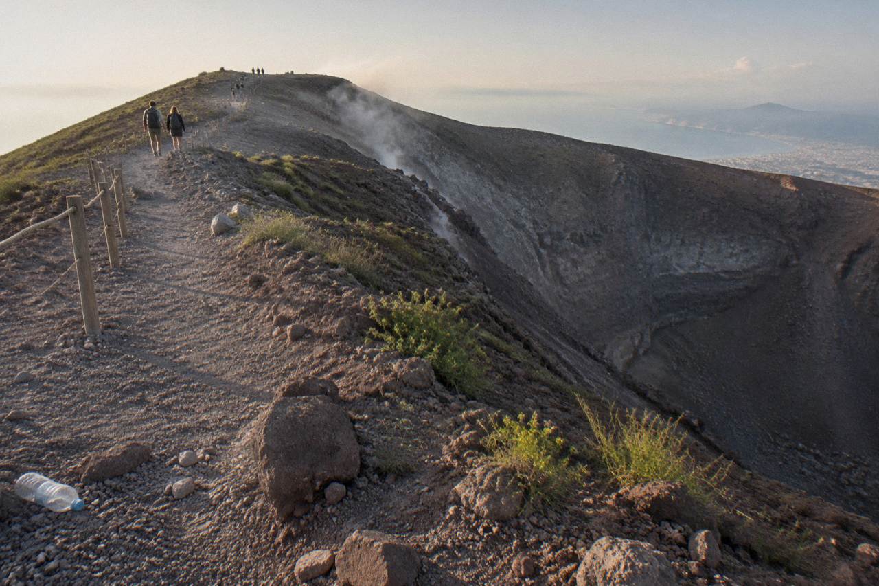 The Gran Cono crater path climbing through grey volcanic ash toward the Vesuvius crater rim