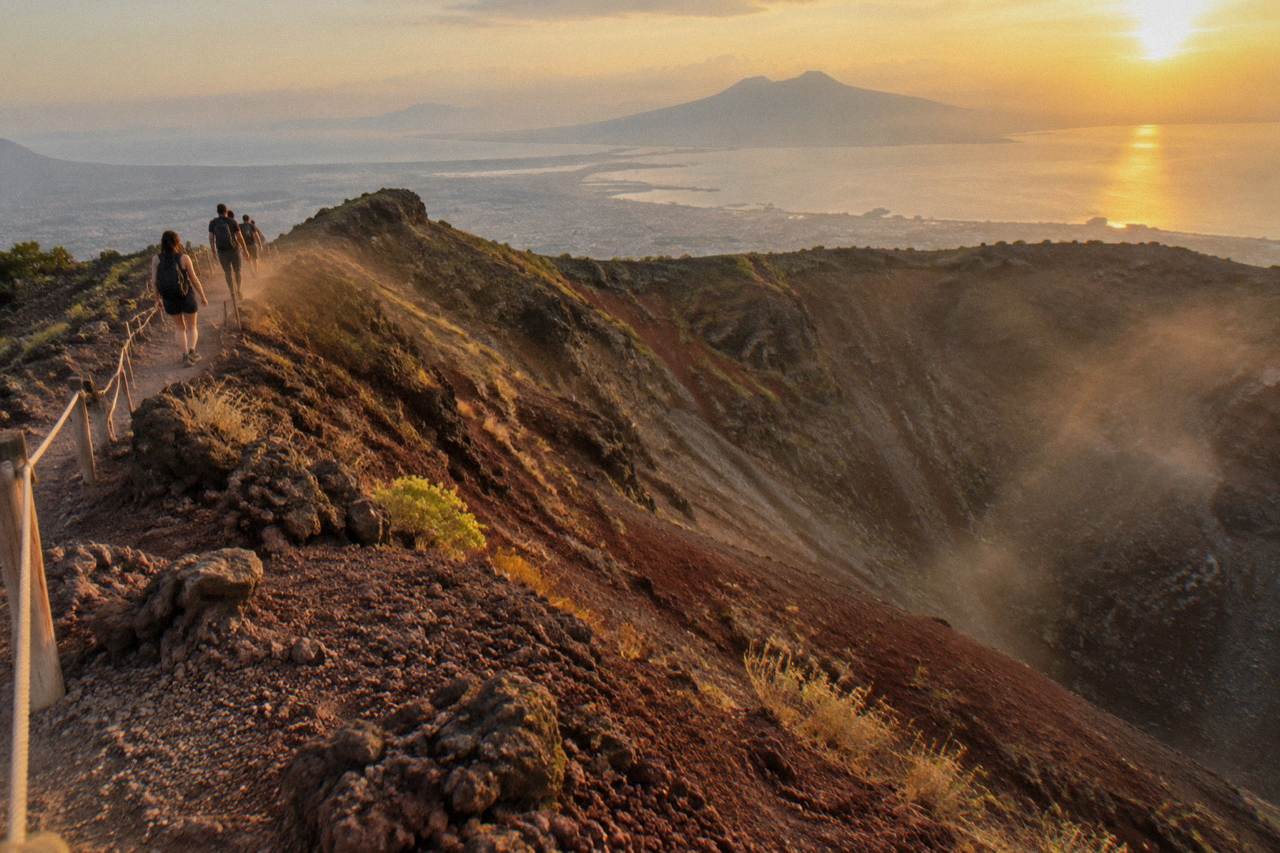 Golden evening light over the Vesuvius crater rim above the Bay of Naples