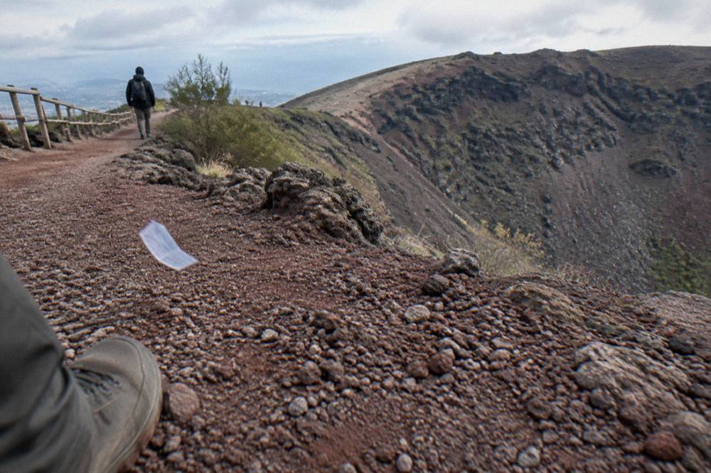 Volcanic ash path on the Gran Cono trail with the Bay of Naples below