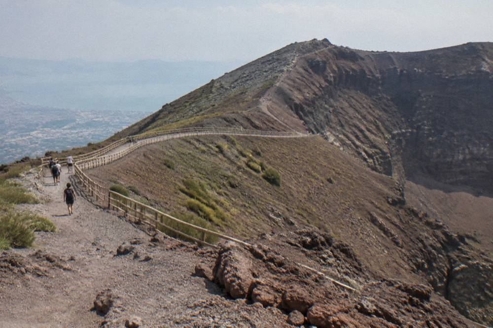 The wide ash path switchbacking up the flank of Vesuvius toward the crater rim