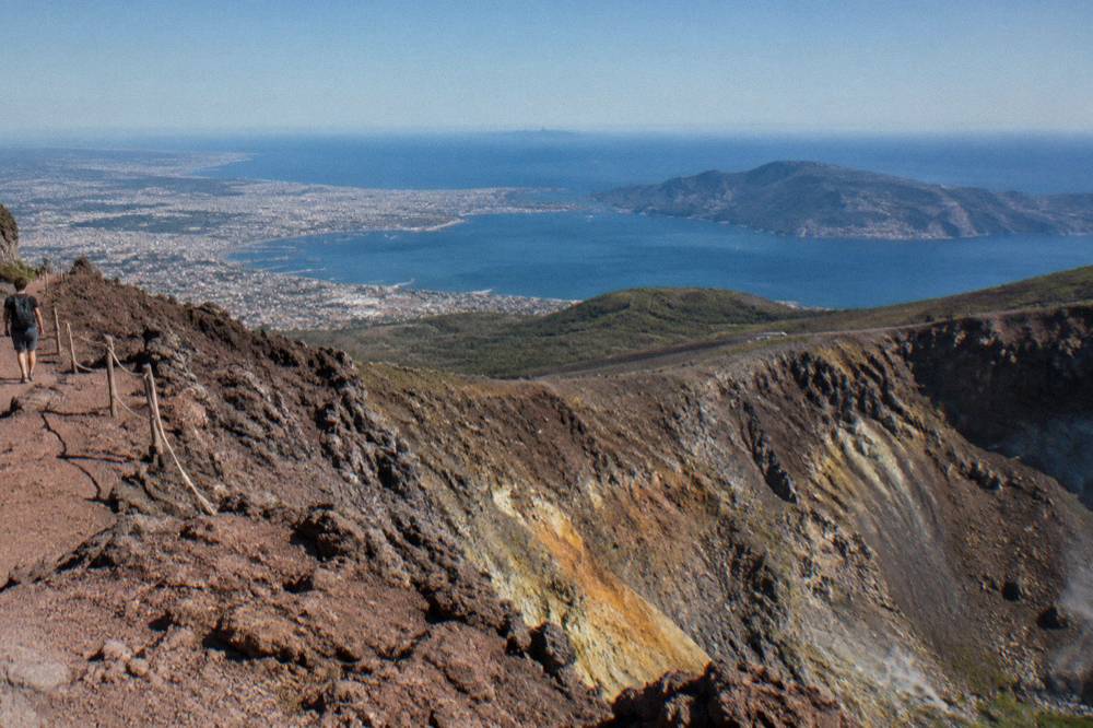 View from the Vesuvius crater rim across the Bay of Naples toward the Sorrento Peninsula in clear air