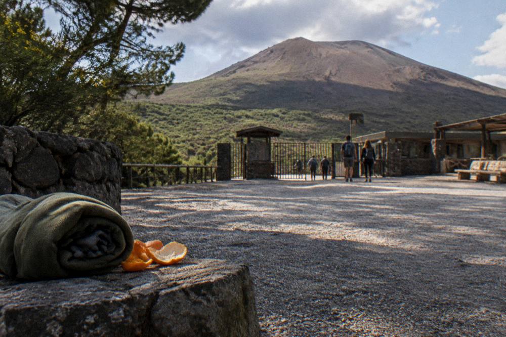 The trailhead plaza at Quota 1000 on Mount Vesuvius under changing mountain weather